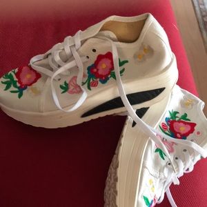 Canvas and embroidered sneakers rubber sole